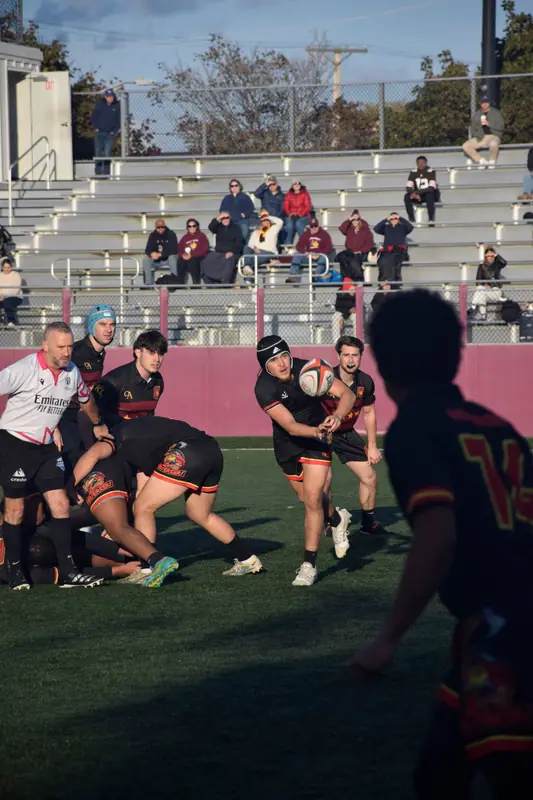 Loyola player carrying against UIC